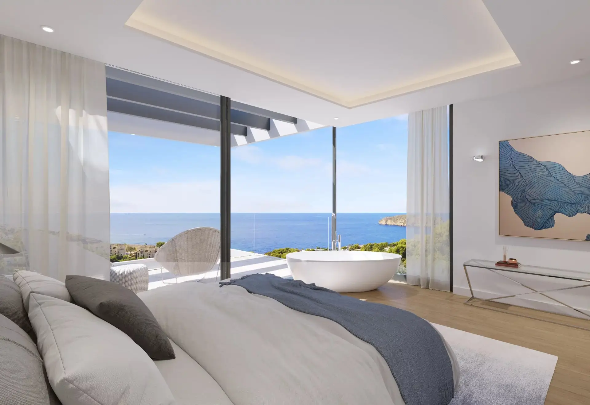 Luxury master bedroom with panoramic sea views and freestanding bathtub in Santa Ponsa, Mallorca — exclusive property represented by Isabella Janoschka