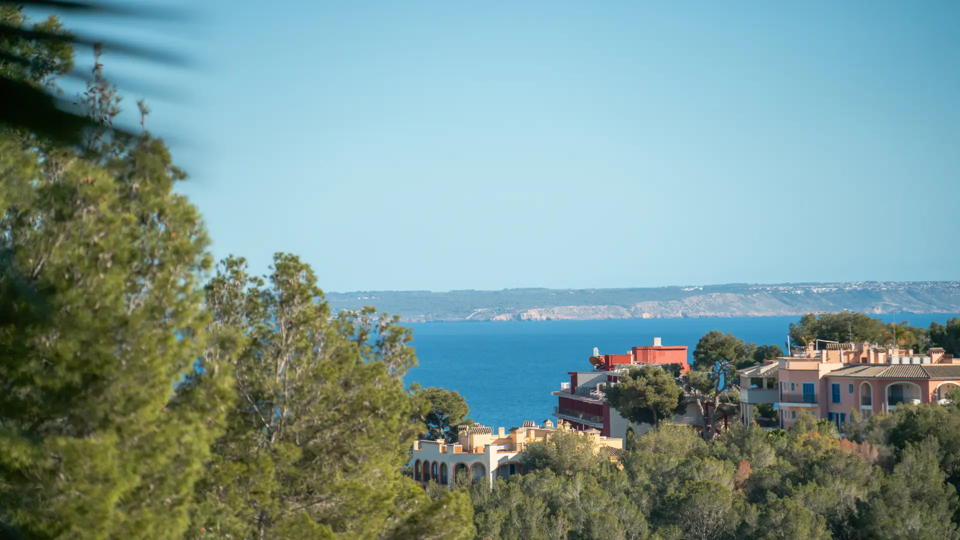 Panoramic sea and coastline views over Bendinat and Portals Nous on Mallorca's southwest coast — luxury residential area represented by Isabella Janoschka