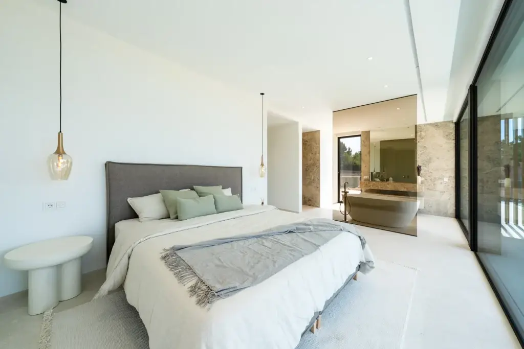 Bedroom with ensuite bathroom at Nova One