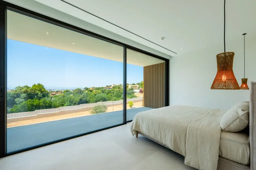 Bedroom overlooking the garden at Nova One