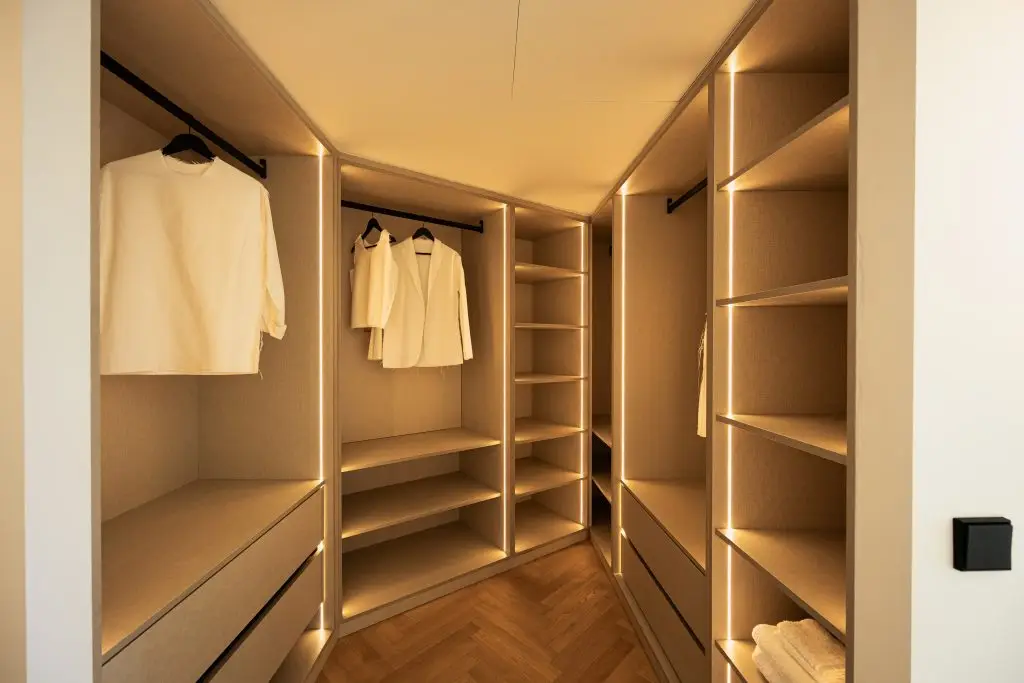Dressing room with illuminated wardrobes at the Old Bendinat villa