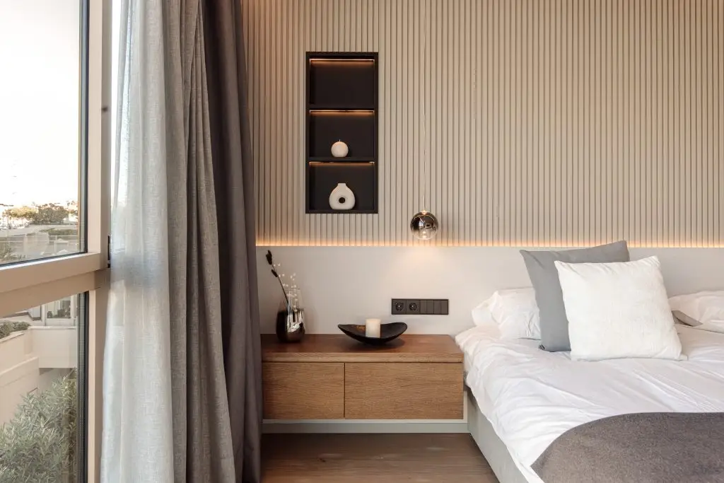 Bedroom detail overlooking the waterfront at the Portixol duplex