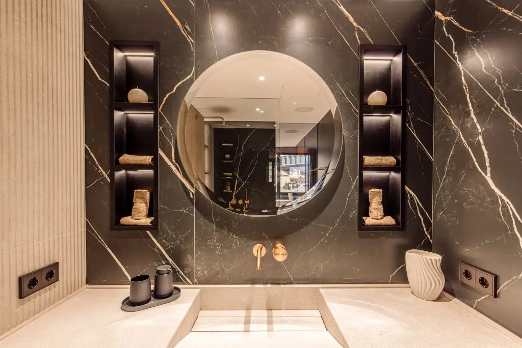 Bathroom vanity with stone finishes at the Portixol duplex