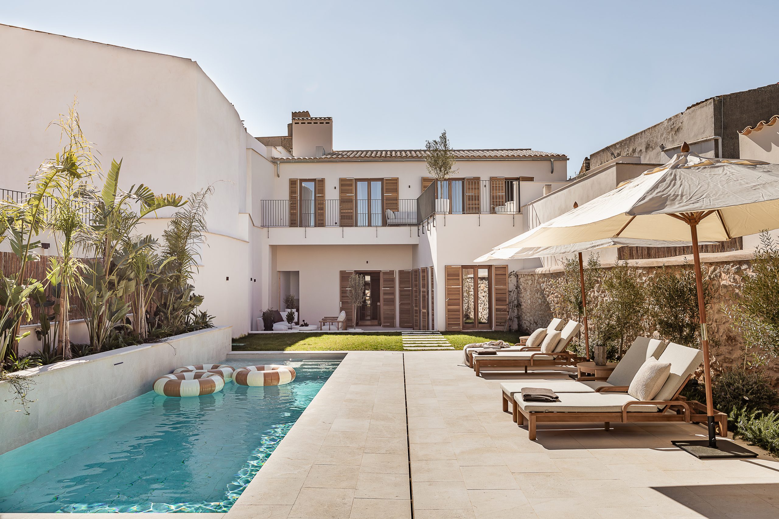 Townhouse and garden viewed across the pool at the Lloseta townhouse