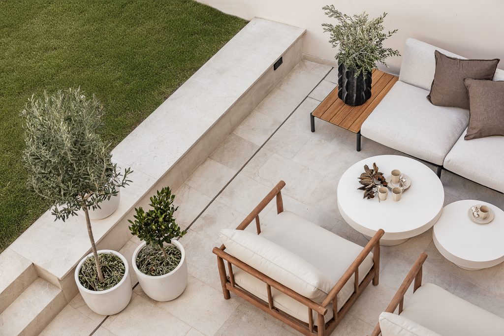 Garden terrace seating viewed from above at the Lloseta townhouse